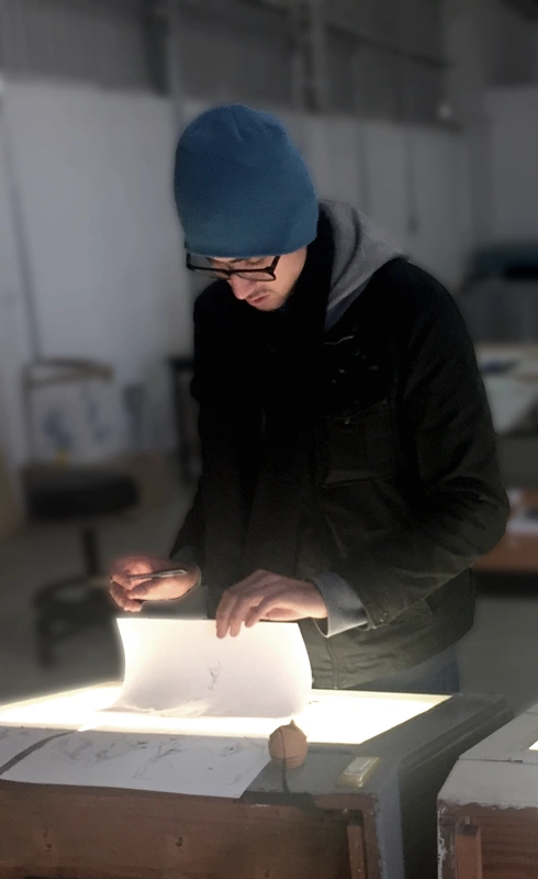 Artist portrait working on a rotoscope project
